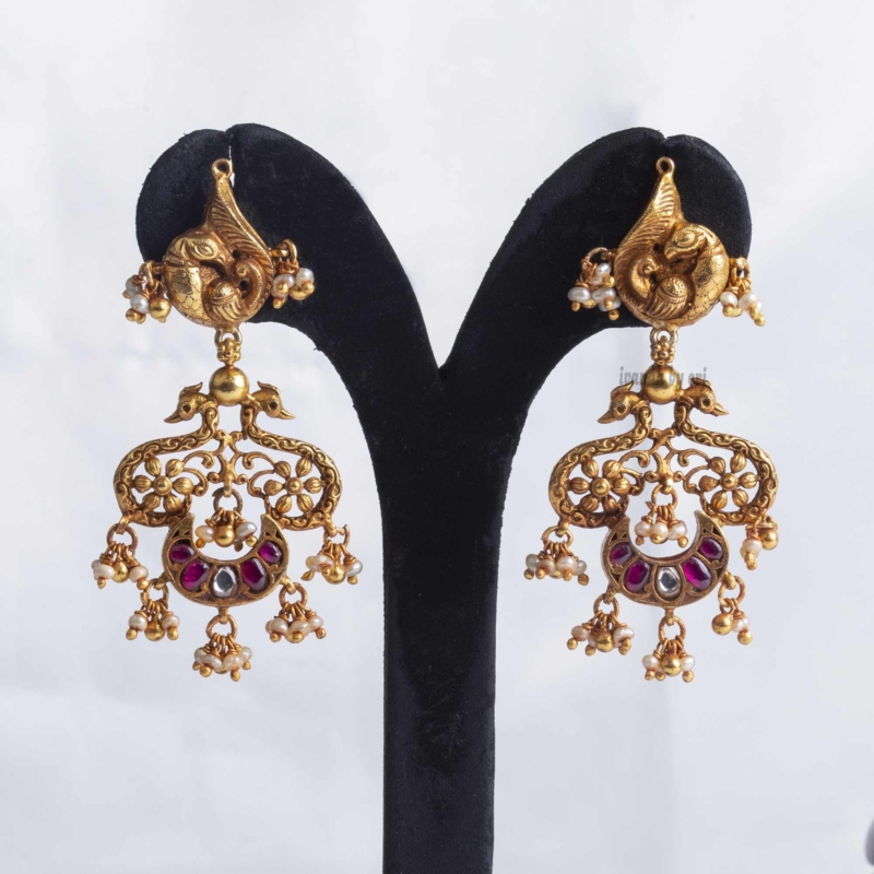 Gold plated silver peacock earrings